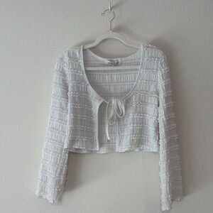 Cropped ruffle tie cardigan